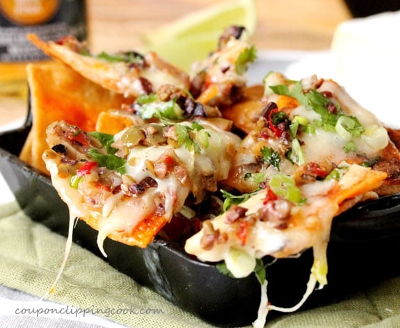 Cheesy Brie and Olive Tapenade Nachos in pan