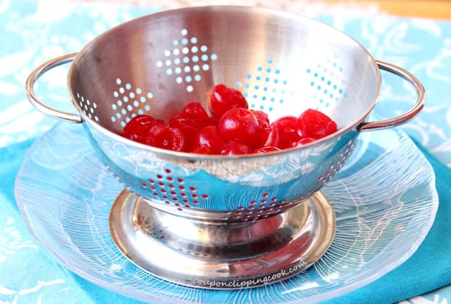 Maraschino cherries in colander