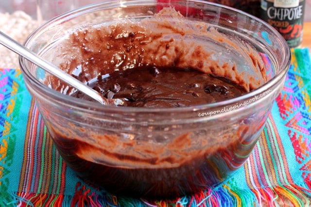 Stir brownie batter in bowl