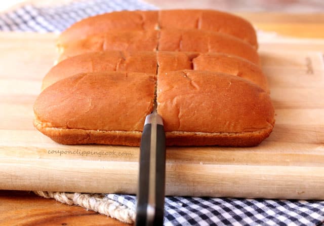 Cutting hot dog buns in half