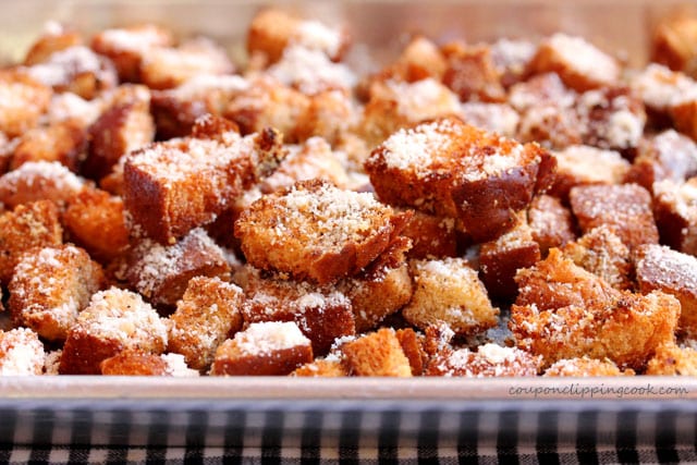 Seasoned hot dog croutons on pan
